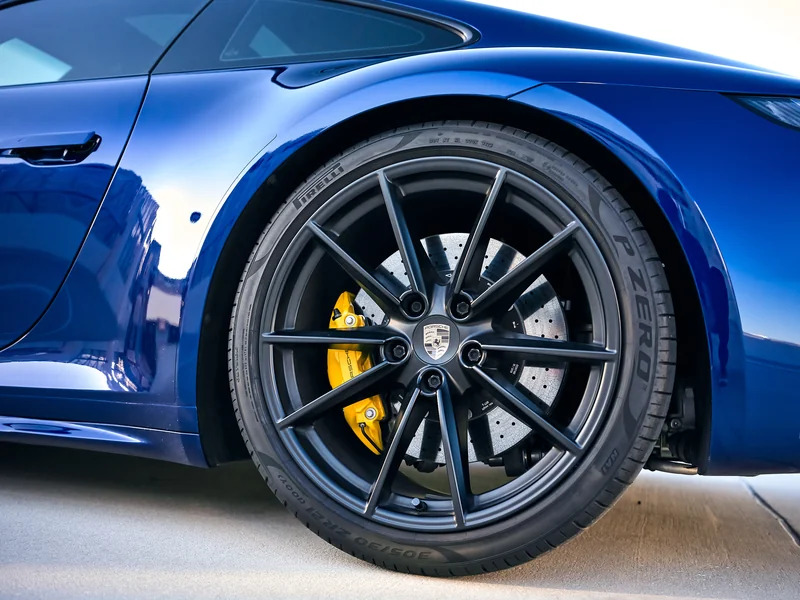 Porsche 911 wheel and caliper, auction photography by Analog Autohaus